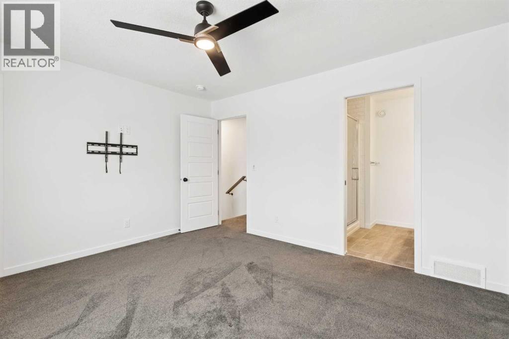 168 Belmont Villas Sw, Calgary, Alberta  T2W 4W7 - Photo 23 - A2280594