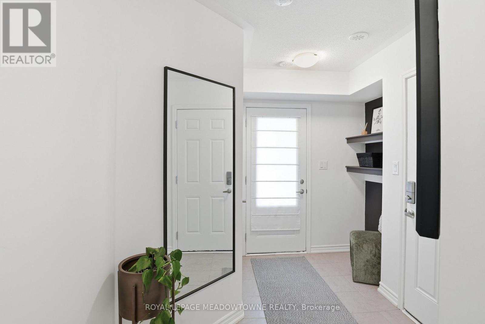 1272 Wintergreen Place, Milton, Ontario  L9E 1S4 - Photo 7 - W12805068