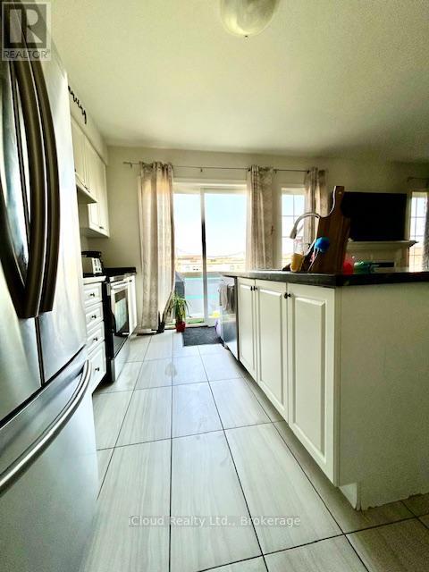 1449 Chretien Street, Milton, Ontario  L9E 1J1 - Photo 4 - W12805112