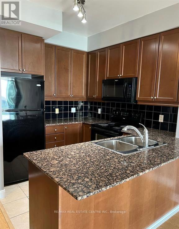 1302 - 70 Absolute Avenue, Mississauga (City Centre), Ontario  L4Z 0A4 - Photo 6 - W12805240