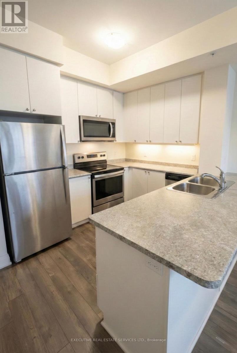 605 - 65 Yorkland Boulevard, Brampton (Goreway Drive Corridor), Ontario  L6P 4M5 - Photo 2 - W12805960