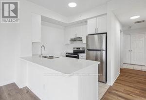 310 - 5705 Long Valley Road, Mississauga (Churchill Meadows), Ontario  L5M 0M3 - Photo 3 - W12806554