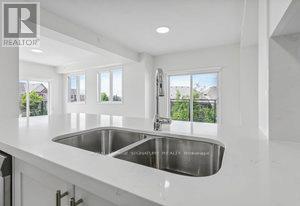 310 - 5705 Long Valley Road, Mississauga (Churchill Meadows), Ontario  L5M 0M3 - Photo 5 - W12806554