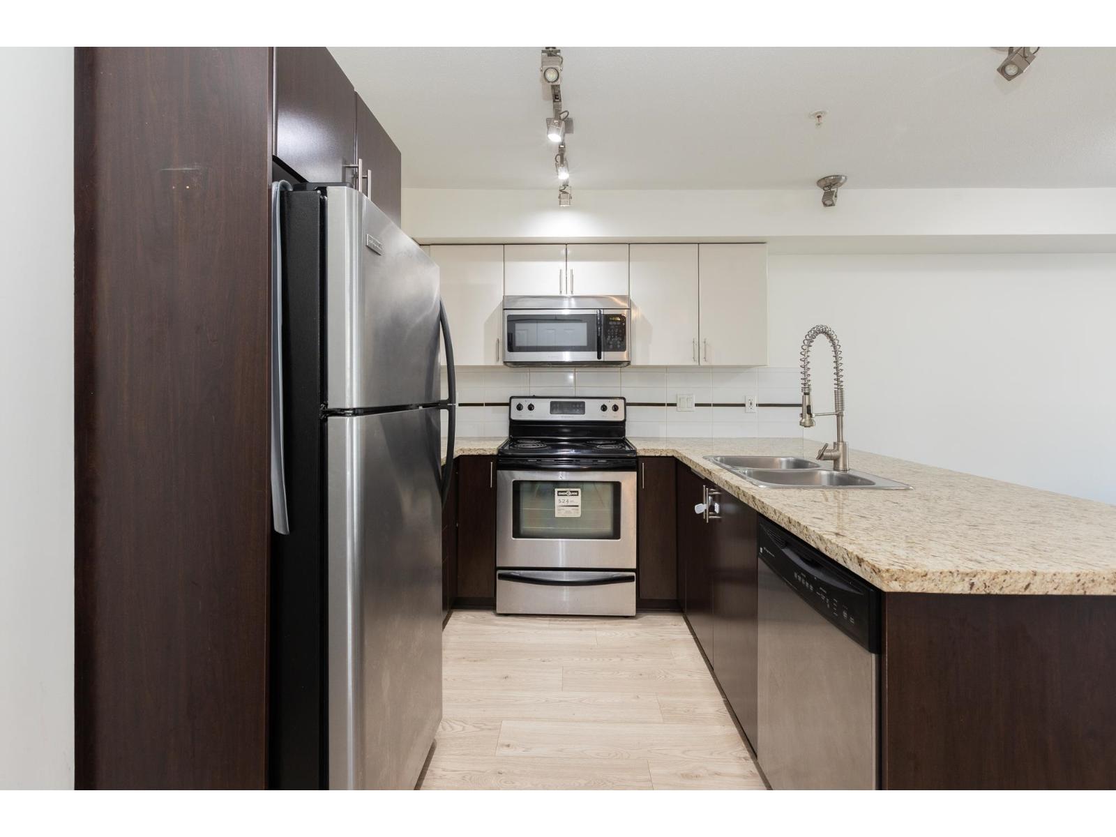 202 14960 102a Avenue, Surrey, British Columbia  V3R 6A3 - Photo 9 - R3091533