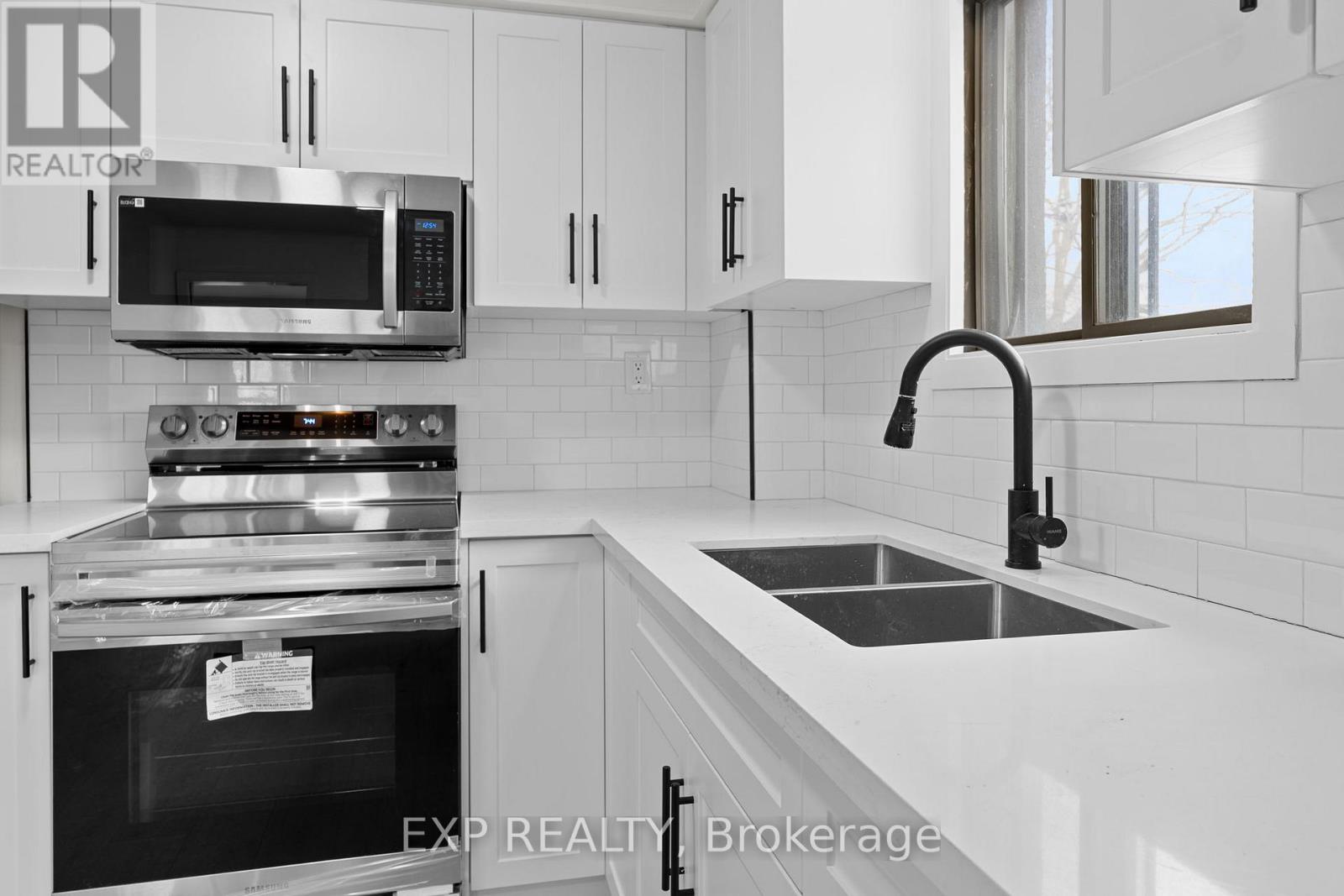 Unit #1 - 1558 Queen Street E, Toronto, Ontario  M4L 1E8 - Photo 10 - E12807970