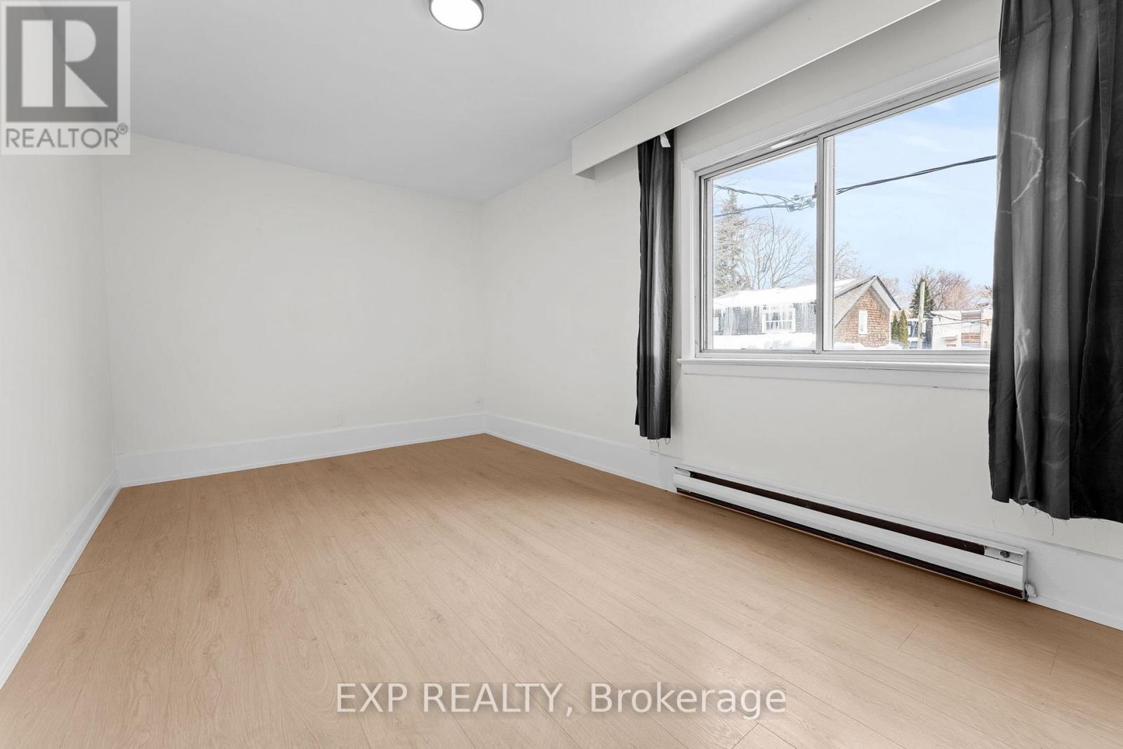 Unit #1 - 1558 Queen Street E, Toronto, Ontario  M4L 1E8 - Photo 18 - E12807970
