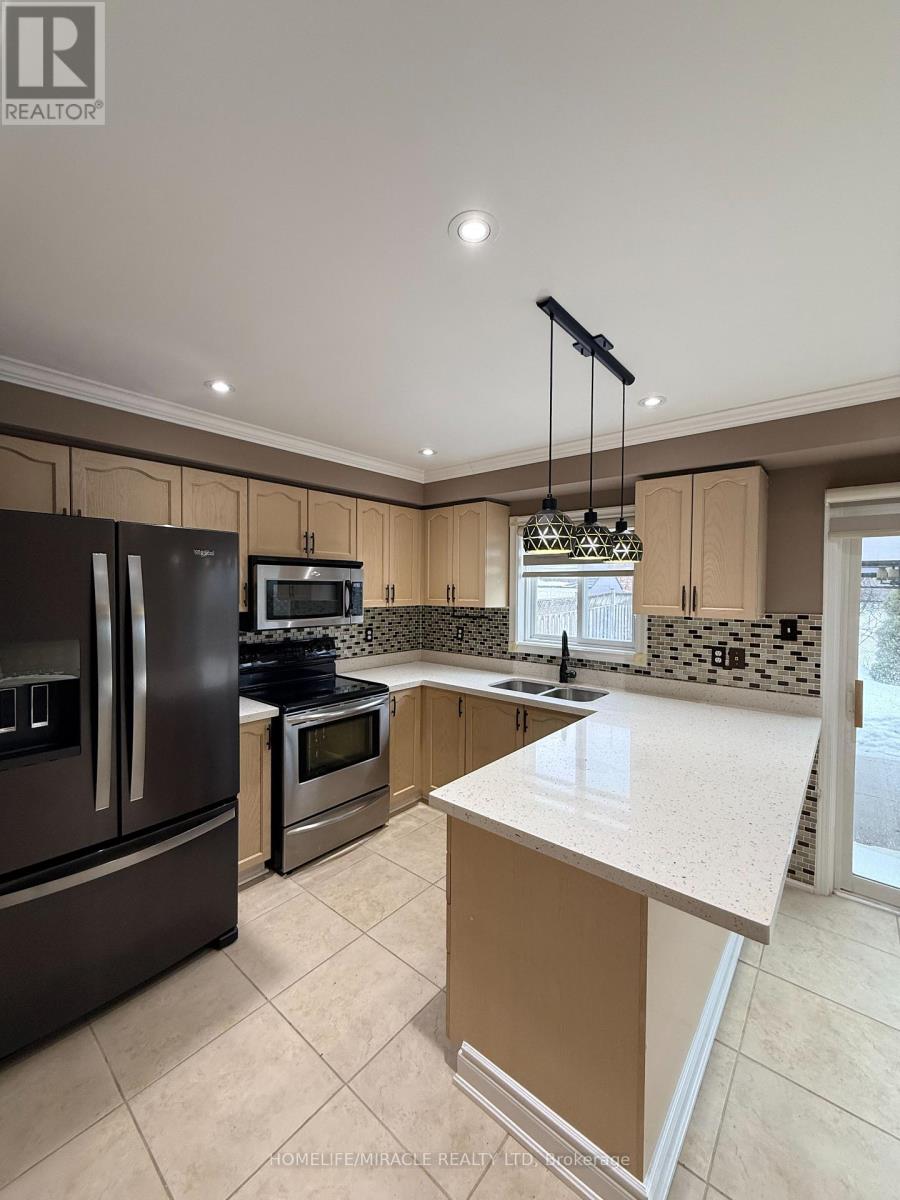 9 Caruso Drive, Brampton, Ontario  L6Y 5B1 - Photo 6 - W12808006