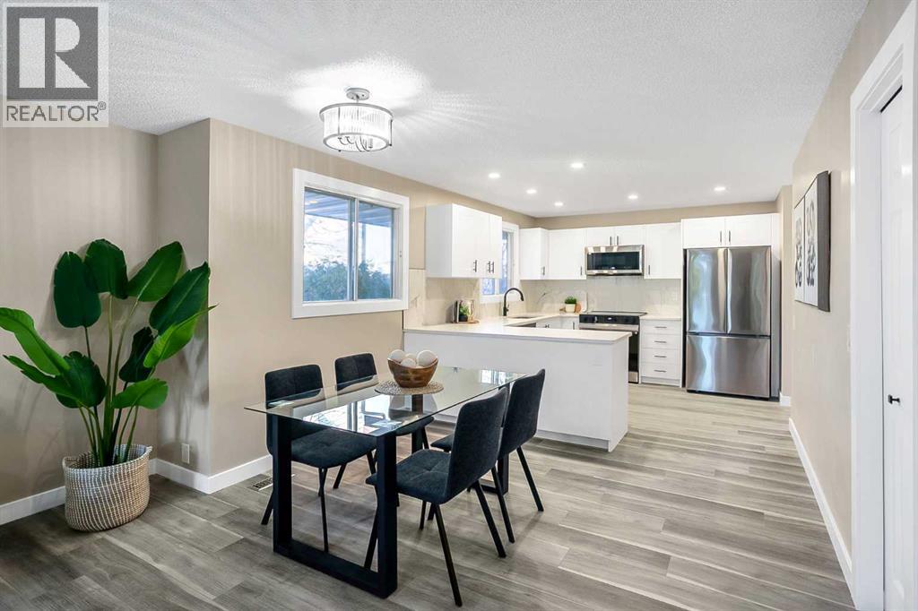 467 Berkley Crescent Nw, Calgary, Alberta T3K 1A9 - Photo 7 - A2280704