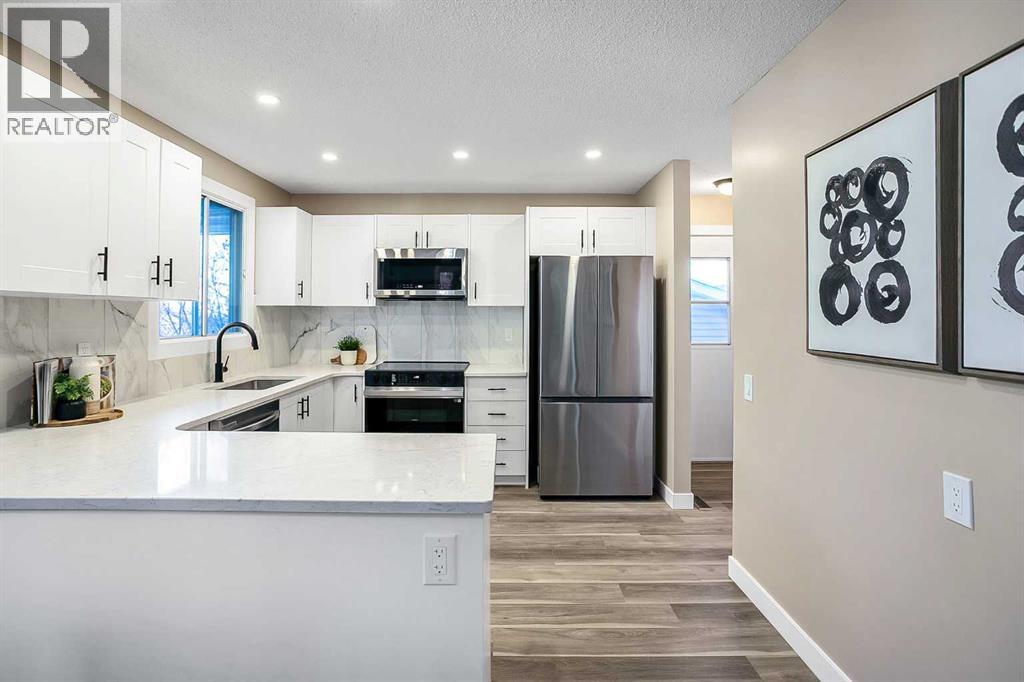 467 Berkley Crescent Nw, Calgary, Alberta T3K 1A9 - Photo 11 - A2280704