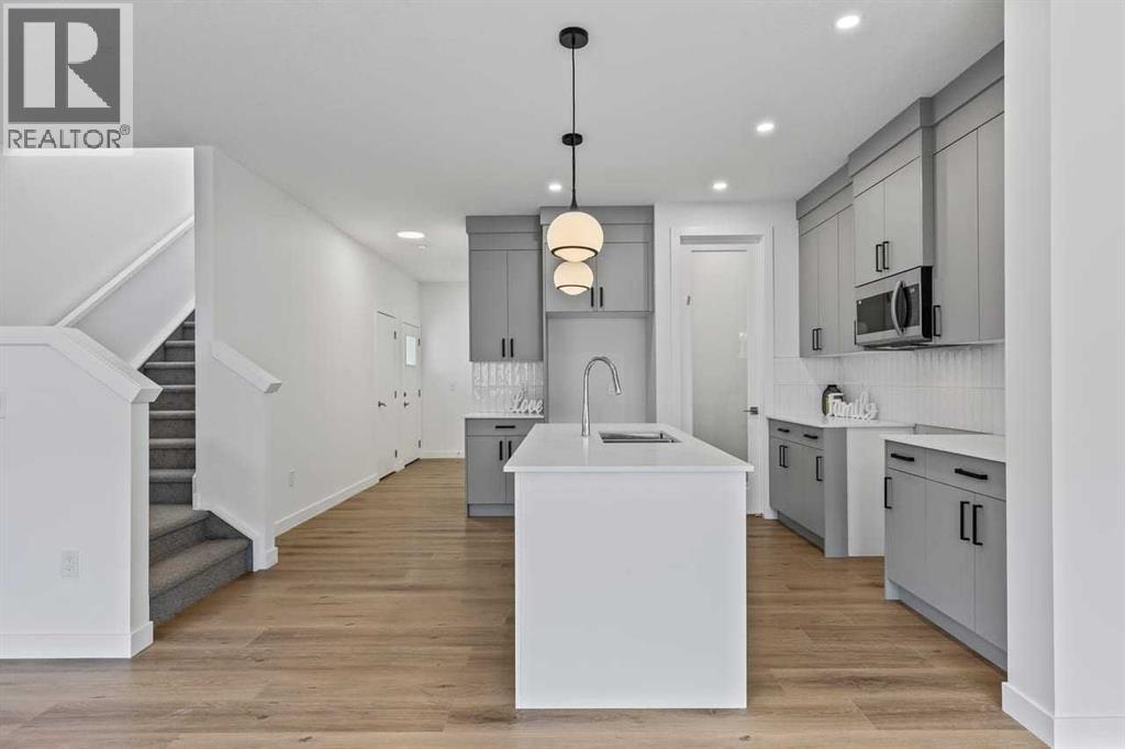 90 Heritage Circle, Cochrane, Alberta  T4C 3G9 - Photo 11 - A2283545