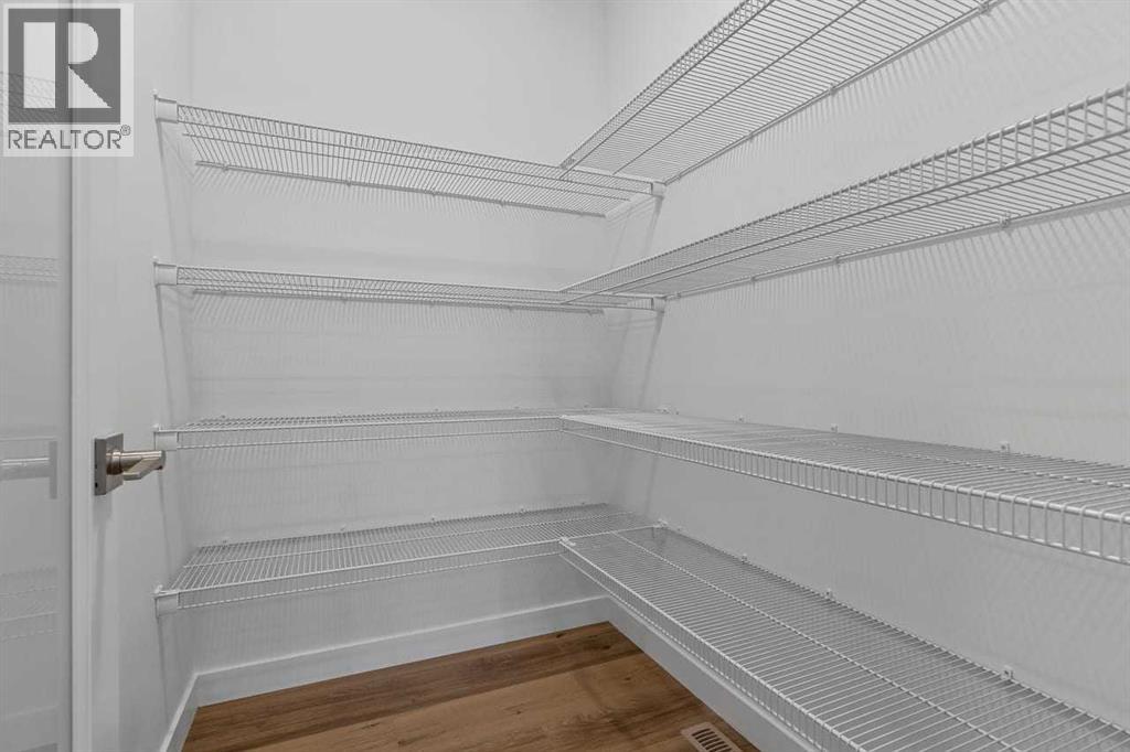 90 Heritage Circle, Cochrane, Alberta  T4C 3G9 - Photo 12 - A2283545