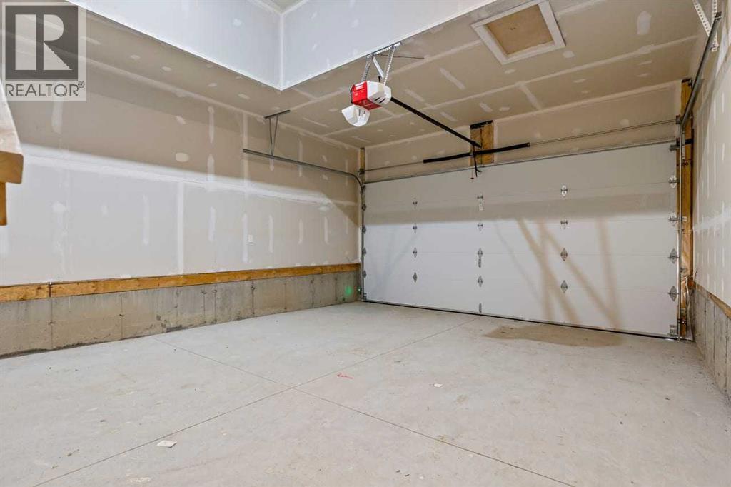 90 Heritage Circle, Cochrane, Alberta  T4C 3G9 - Photo 40 - A2283545