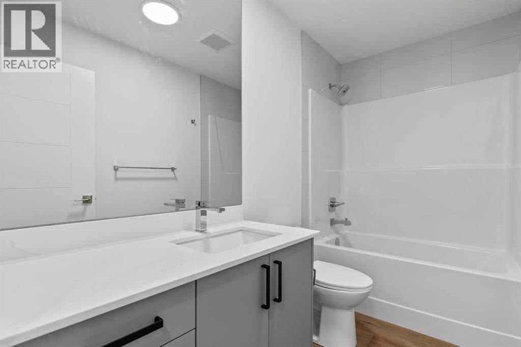 90 Heritage Circle, Cochrane, Alberta  T4C 3G9 - Photo 35 - A2283545