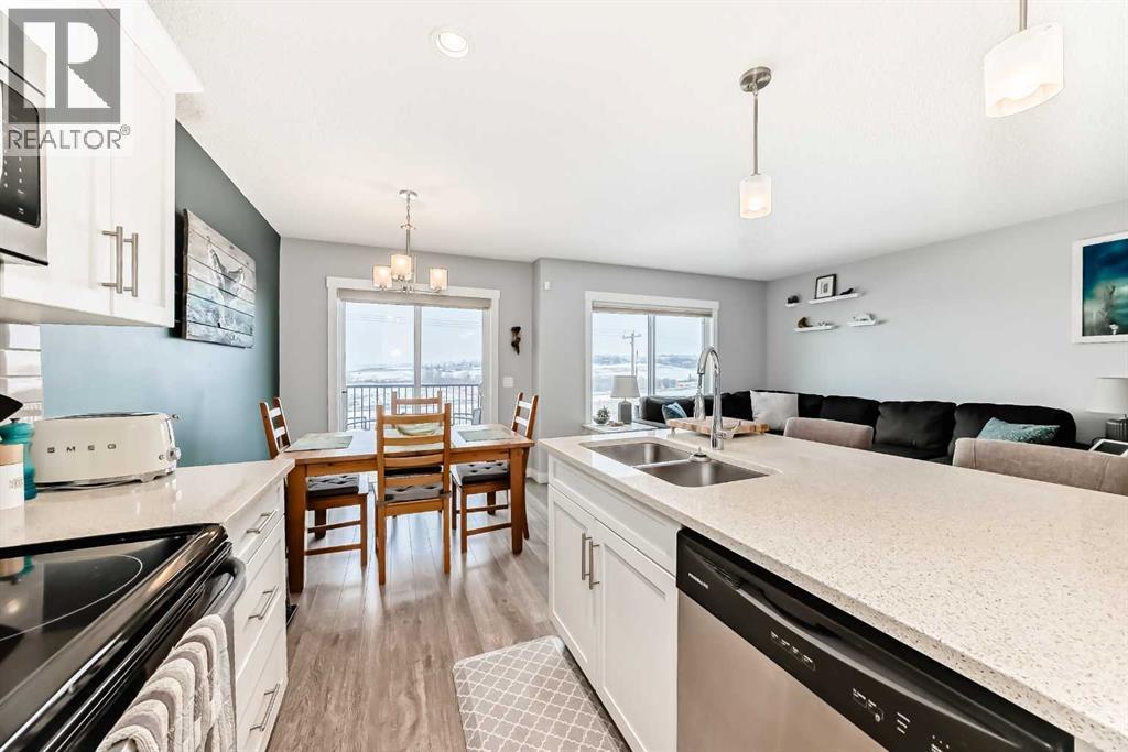 303 Sunrise View, Cochrane, Alberta  T4C 0Z7 - Photo 8 - A2287350