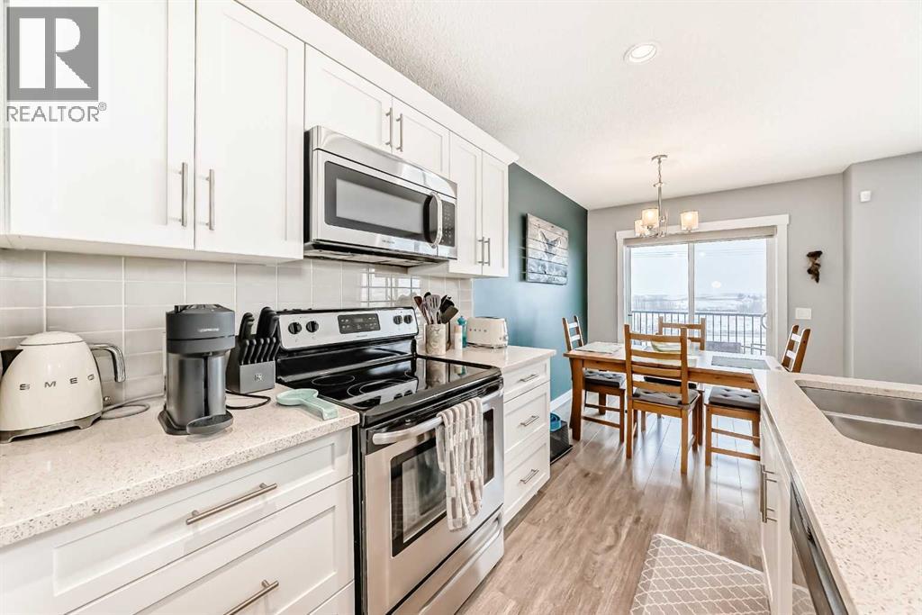 303 Sunrise View, Cochrane, Alberta  T4C 0Z7 - Photo 9 - A2287350