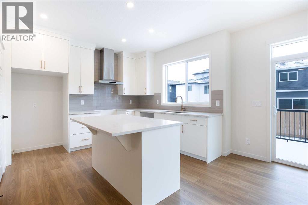 65 Creekside Passage Sw, Calgary, Alberta  T2X 5V6 - Photo 7 - A2279253