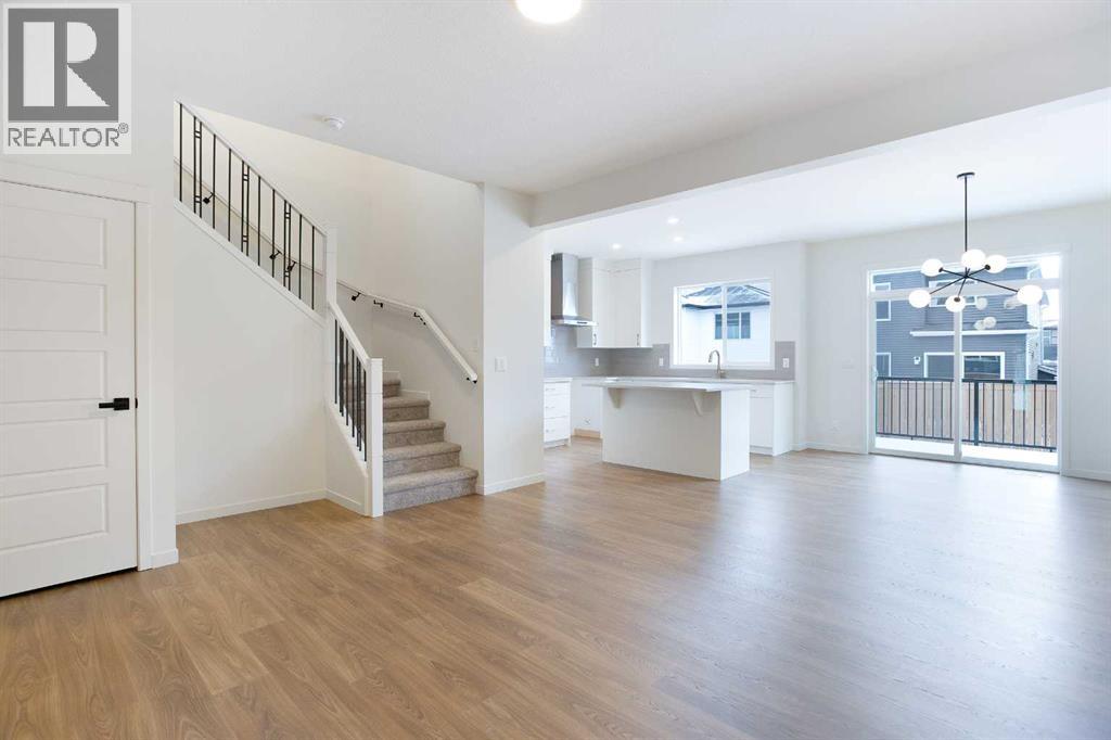 65 Creekside Passage Sw, Calgary, Alberta  T2X 5V6 - Photo 2 - A2279253