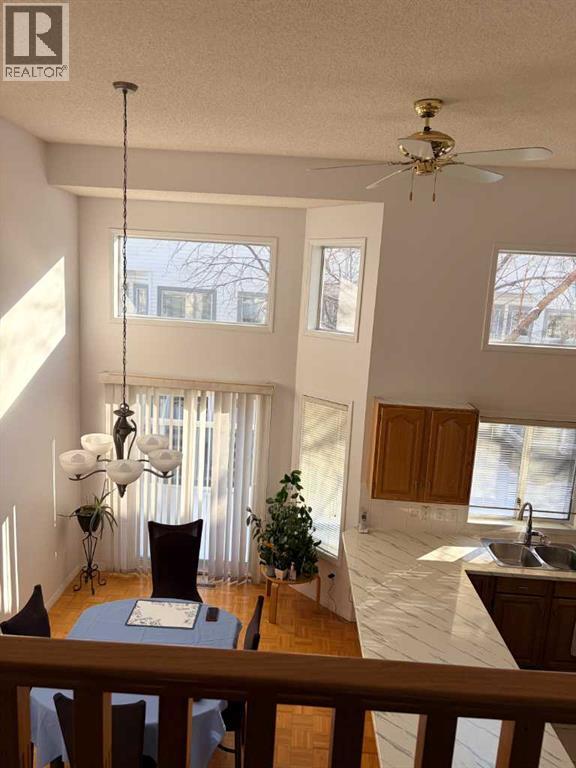 4 Kingsland Villas Sw, Calgary, Alberta  T2V 5J9 - Photo 2 - A2287025