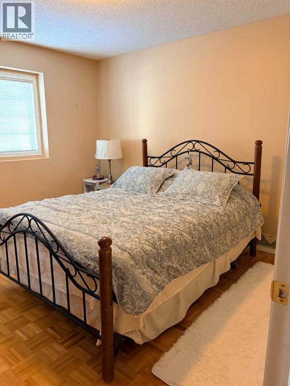 4 Kingsland Villas Sw, Calgary, Alberta  T2V 5J9 - Photo 14 - A2287025