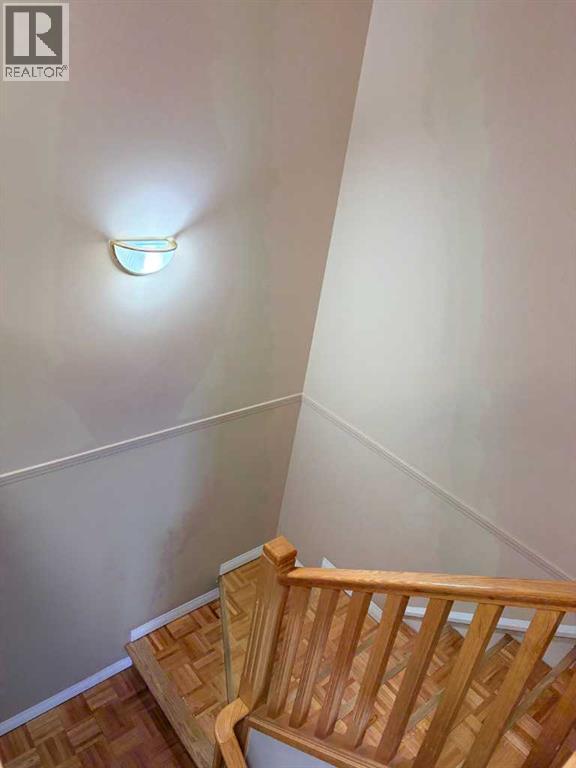 4 Kingsland Villas Sw, Calgary, Alberta  T2V 5J9 - Photo 16 - A2287025