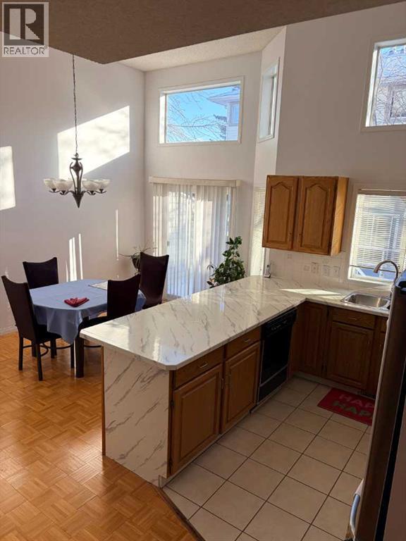 4 Kingsland Villas Sw, Calgary, Alberta  T2V 5J9 - Photo 3 - A2287025