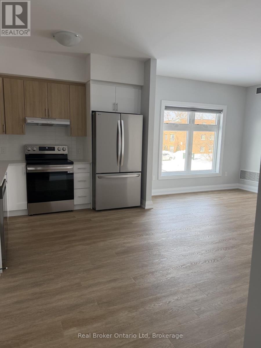 201 - 60 Donald Street, Barrie (Queen's Park), Ontario  L4N 1E3 - Photo 2 - S12808876