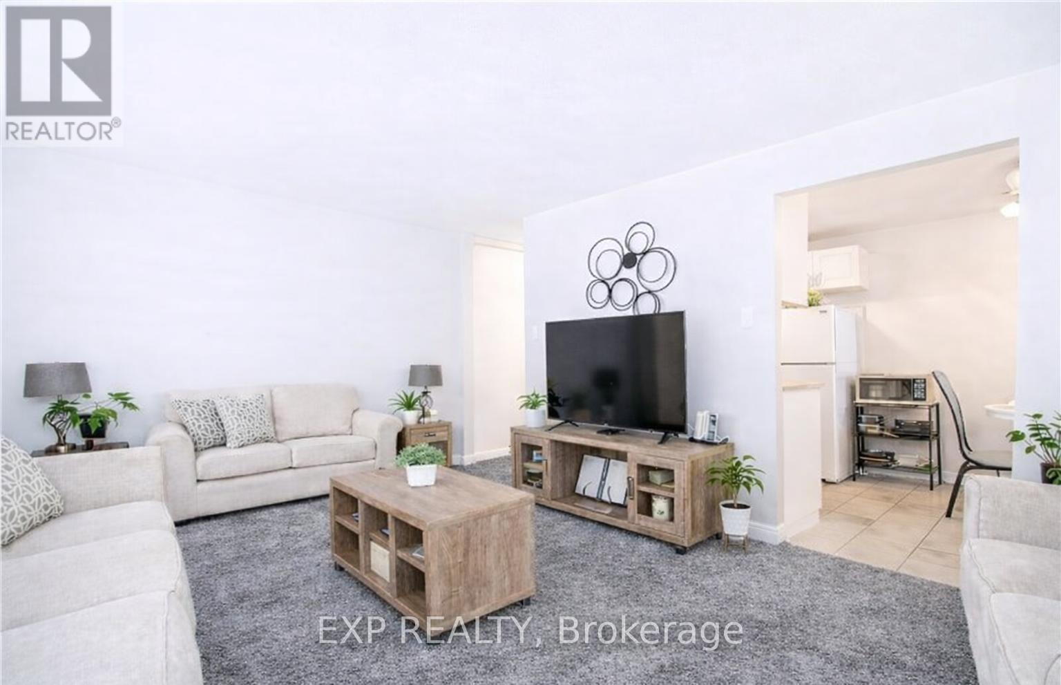 8 - 527 Parkside Drive, Waterloo, Ontario  N2L 4X7 - Photo 4 - X12669468