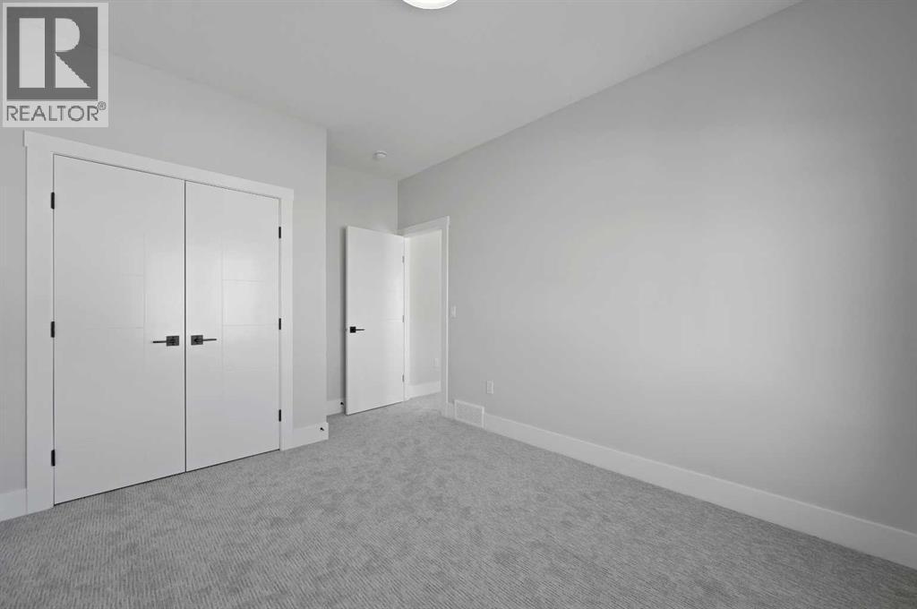 68 Heritage Ridge, Cochrane, Alberta  T4C 2J8 - Photo 27 - A2273193