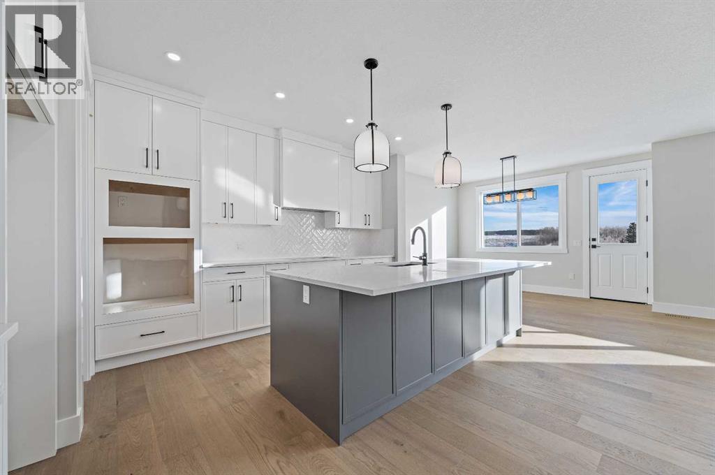 68 Heritage Ridge, Cochrane, Alberta  T4C 2J8 - Photo 3 - A2273193