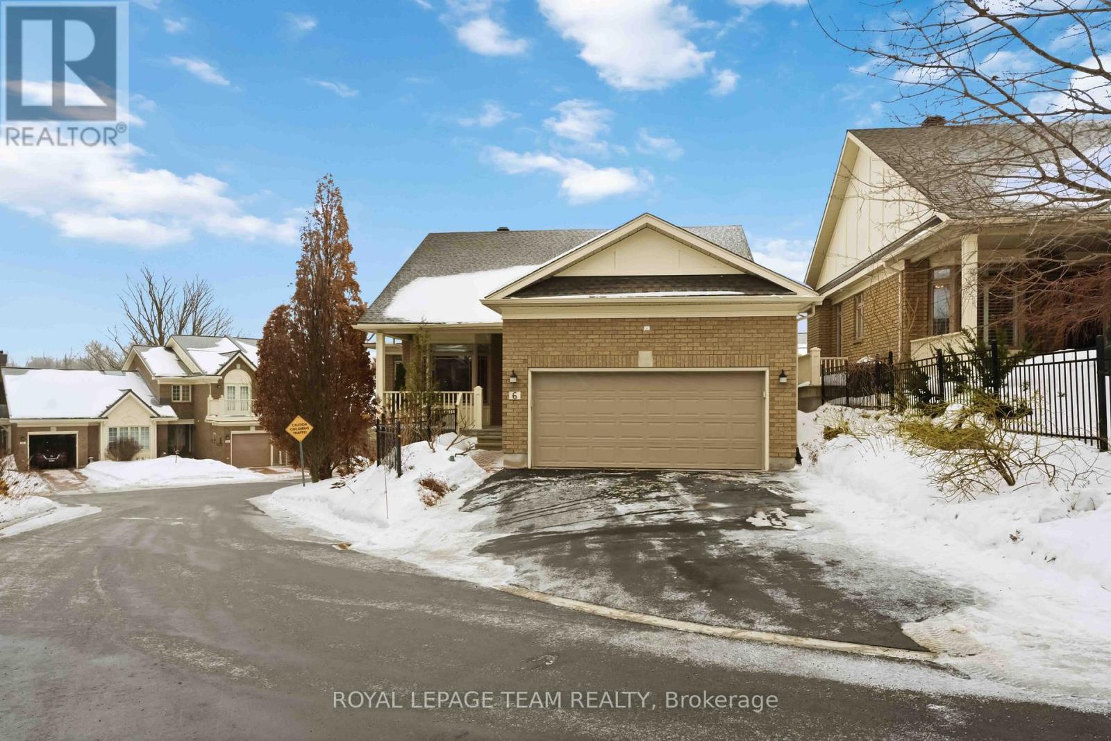 Welcome to this truly magnificent, one-of-a-kind, highly customized bungalow with a fully finished walk-out lower level-loaded with quality craftsmanship and upscale upgrades throughout. Meticulously maintained with exceptional attention to detail, this stunning home features 9-foot ceilings, premium 24" x 24" porcelain tile, and rich hardwood flooring across the main level. The custom gourmet kitchen is beautifully appointed with granite countertops, quality cabinetry, premium stainless steel appliances, and an ideal layout for both everyday living and entertaining. The open-concept living and dining areas are warm and inviting, highlighted by a gas fireplace with custom mantle and large bright windows dressed with custom blinds. The spacious primary retreat offers a luxurious, customized 5-piece ensuite bath designed for comfort and elegance. Custom trim work, a striking wooden staircase with custom banister, and refined finishes further elevate the home's character. Step outside to the expansive raised deck overlooking beautifully landscaped grounds featuring an interlock patio, privacy fencing, and perennial gardens - perfect for relaxing or hosting. The versatile walk-out lower level is filled with natural light and thoughtfully finished, offering a generous family room with gas fireplace, two spacious bedrooms, kitchenette, workshop area, and abundant storage - ideal for extended family, guests, home office, in-law suite/multi-generational living. Enjoy the added bonus of a nearby path to the river with boat docking access. Immaculate condition throughout - just move in and enjoy! (id:48254)