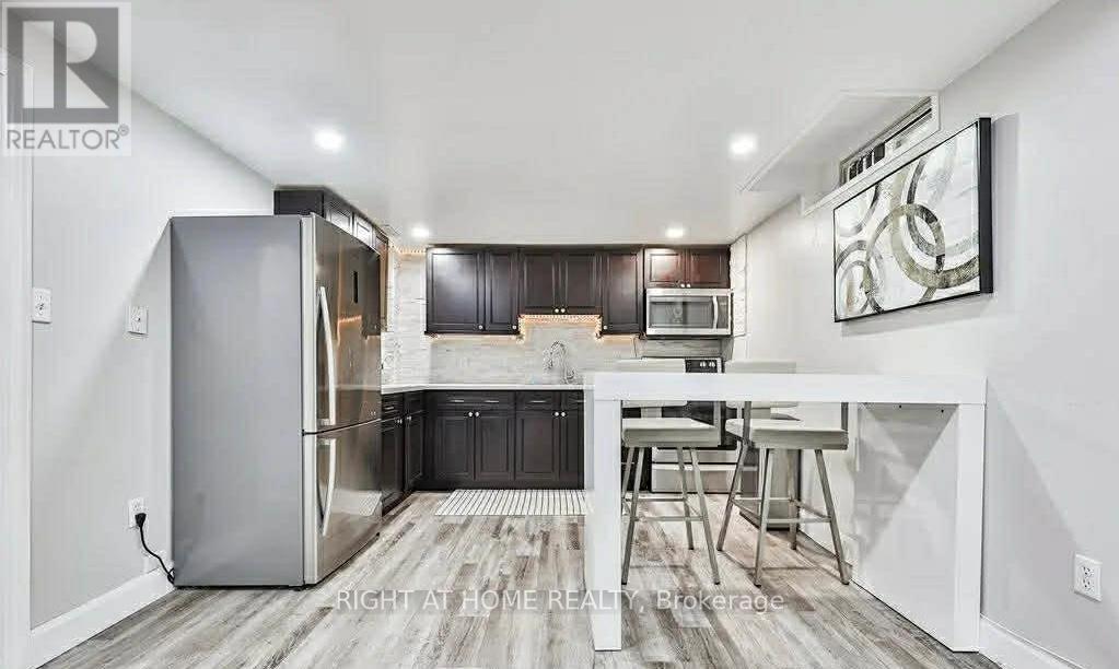 8 Fred Young Drive, Toronto, Ontario  M3L 0A2 - Photo 6 - W12809234