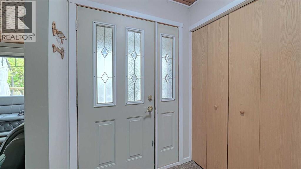 247 Shore Drive, Rural Rocky View County, Alberta  T2M 4L5 - Photo 13 - A2262909