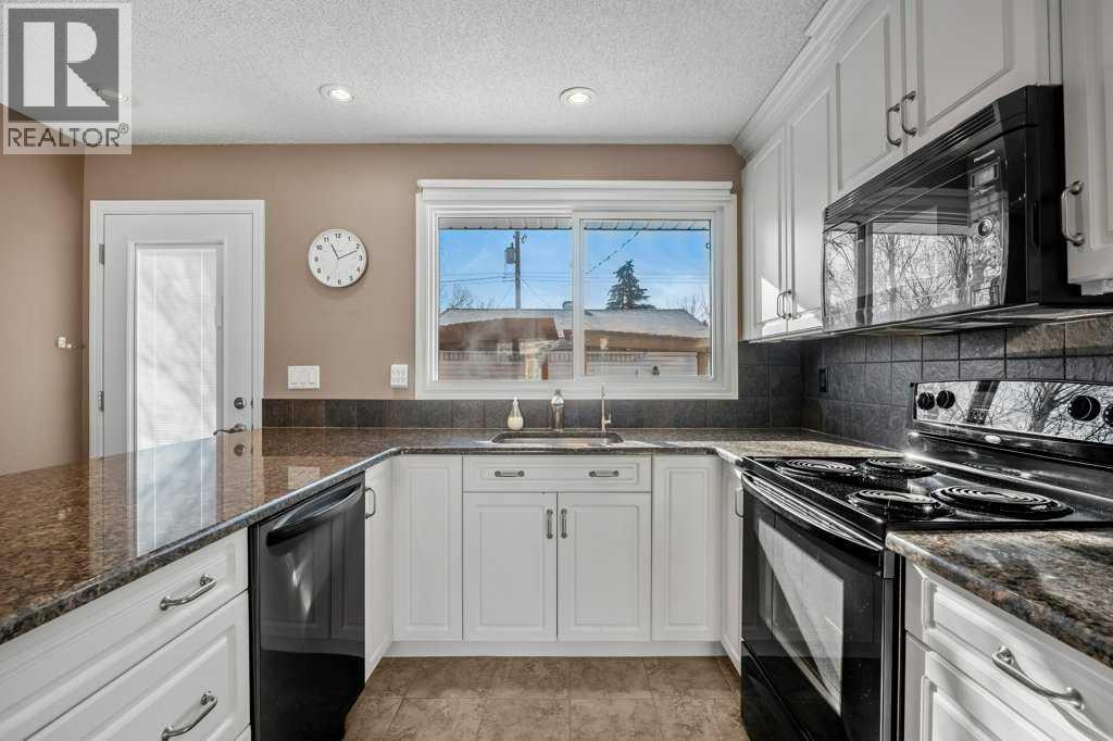 417 Huntington Way Ne, Calgary, Alberta  T2K 5A7 - Photo 8 - A2287372