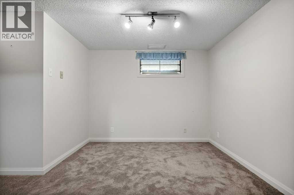 417 Huntington Way Ne, Calgary, Alberta  T2K 5A7 - Photo 29 - A2287372