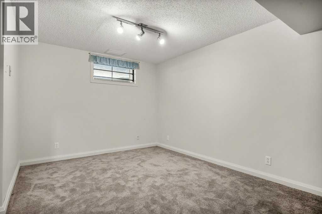 417 Huntington Way Ne, Calgary, Alberta  T2K 5A7 - Photo 28 - A2287372