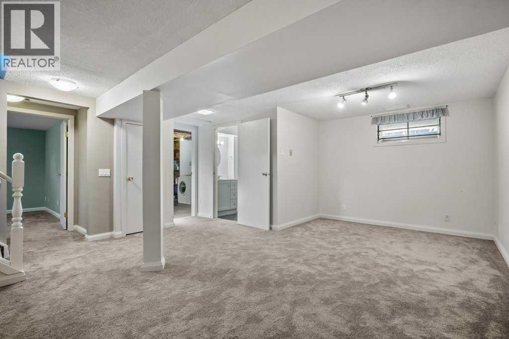 417 Huntington Way Ne, Calgary, Alberta  T2K 5A7 - Photo 27 - A2287372