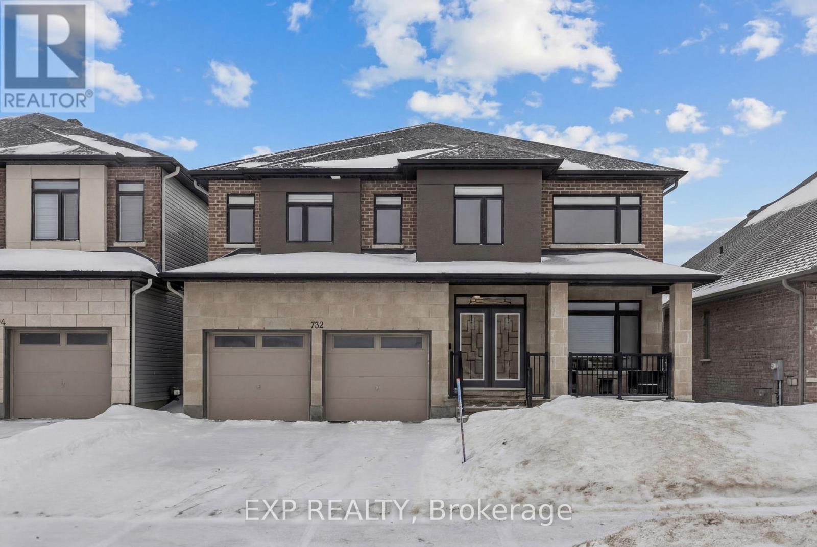 ARCHITECTURAL FLOW AND EVERYDAY LUXURY meet in this masterfully designed residence where every floor tells a story of scale and connectivity. The centerpiece is a stunning OPEN-TO-ABOVE LIVING ROOM anchored by a beautiful GOLDEN CHANDELIER that highlights the home's incredible height, while MAPLE WRAP-AROUND RAILINGS from the second level ensure every room feels connected to the heart of the home. The kitchen is a true showstopper, featuring a MASSIVE ISLAND WITH WATERFALL EDGES ON BOTH SIDES, seamlessly BUILT-IN APPLIANCES, and an endless array of custom drawers and pull-outs. Designed for the modern professional, the main floor offers TWO DENS PLUS A FULL BATHROOM, providing total flexibility for DUAL HOME OFFICES or MULTIGENERATIONAL LIVING. Upstairs, the layout is impressively spacious with FIVE BEDROOMS AND THREE FULL BATHS, including a luxurious 5-PIECE ENSUITE, a SECOND ENSUITE, and a JACK-AND-JILL BATH, while the primary suite features a WALK-IN CLOSET THE SIZE OF A BEDROOM. The FINISHED BASEMENT is built for entertainment with a MOVIE SECTION, PLAY AREA, AND LOUNGE, plus a massive unfinished wing for a HOME GYM OR STORAGE. Step outside to a LARGE DECK AND FULLY FENCED YARD in prime RIVERSIDE SOUTH, located minutes from the RIDEAU RIVER trails and boating, the LRT, and the future TOWN CENTRE. YOUR SEARCH ENDS HERE. (id:48254)