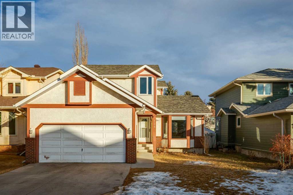 124 Woodmark Crescent SW, Calgary, Alberta