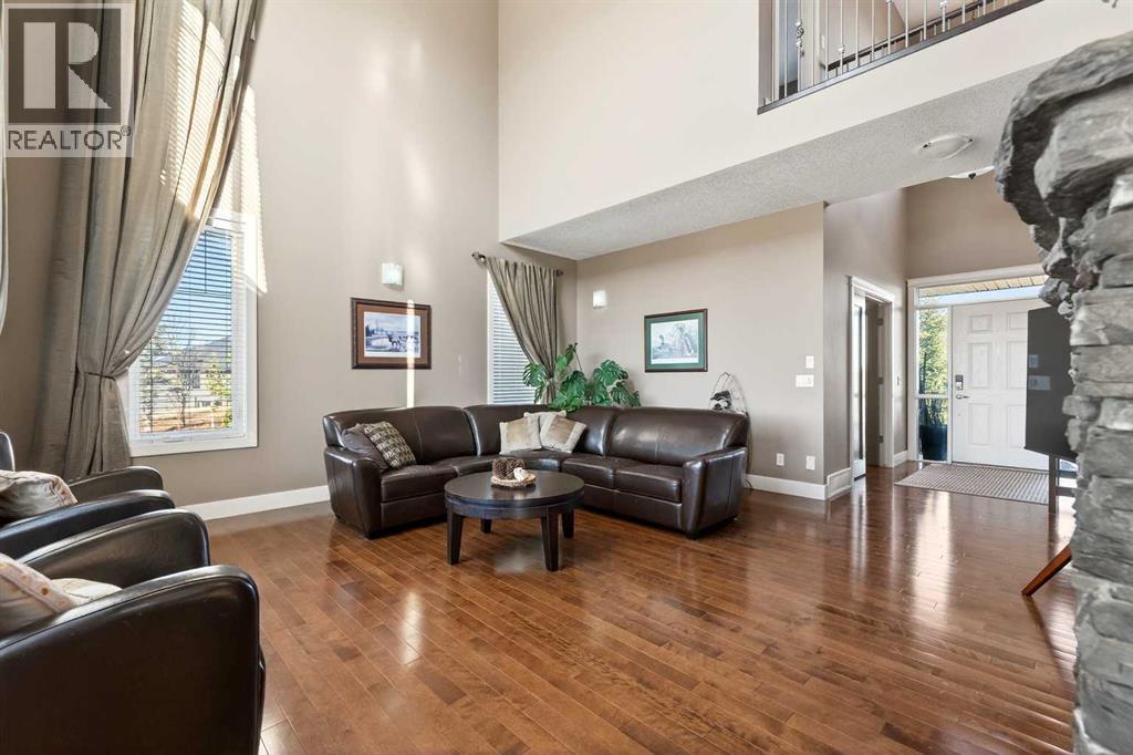 106 Montenaro Crescent, Rural Rocky View County, Alberta  T4C 1A5 - Photo 3 - A2285057