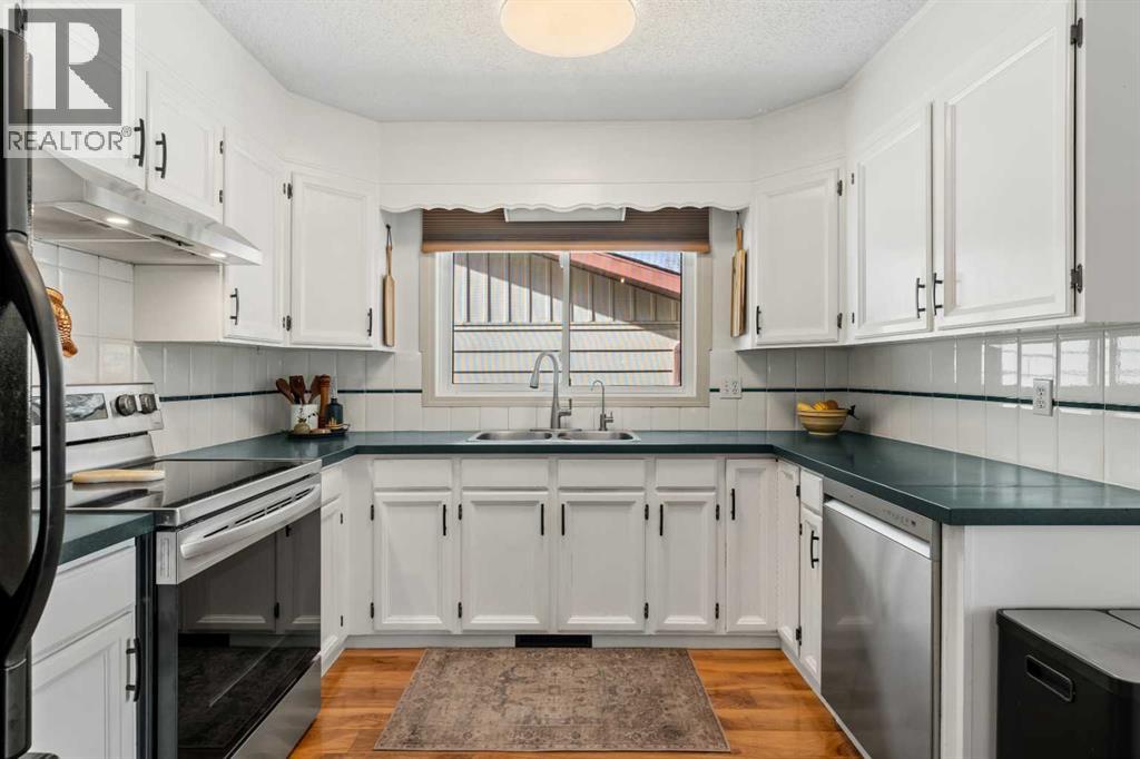 51 Berwick Hill Nw, Calgary, Alberta  T3K 1C4 - Photo 9 - A2287109