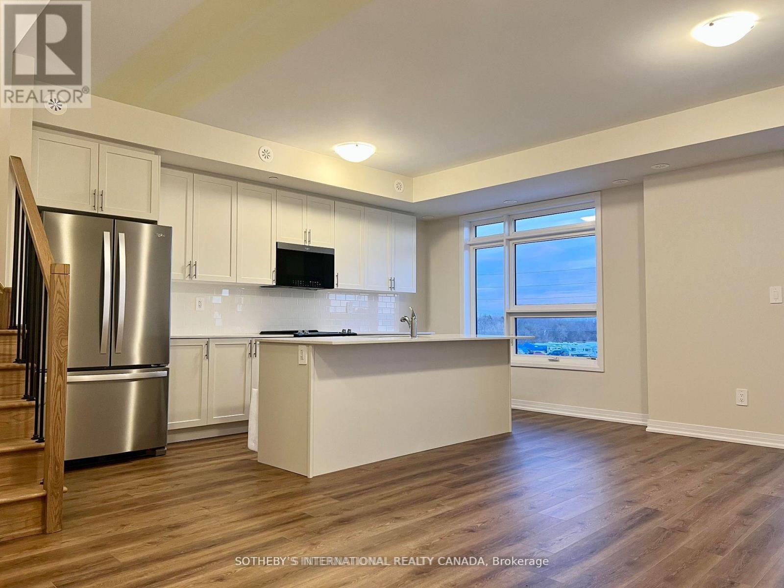 103 - 1585 Rose Way, Milton, Ontario L9T 7E7 - Photo 4 - W12809976