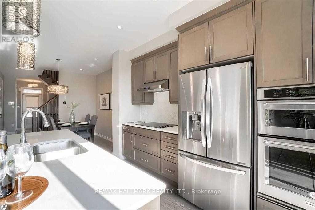 110 Kaitting Trail, Oakville, Ontario  L6M 5K8 - Photo 7 - W12810006