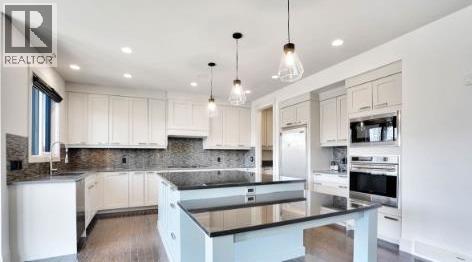 54 Wexford Crescent Sw, Calgary, Alberta  T3h 0h1 - Photo 12 - A2287547