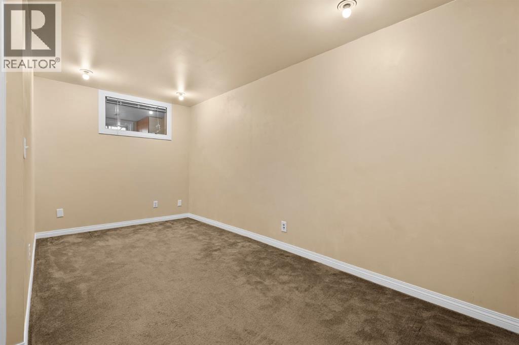 4416 Quentin Court Sw, Calgary, Alberta  T2T 6B9 - Photo 27 - A2286415