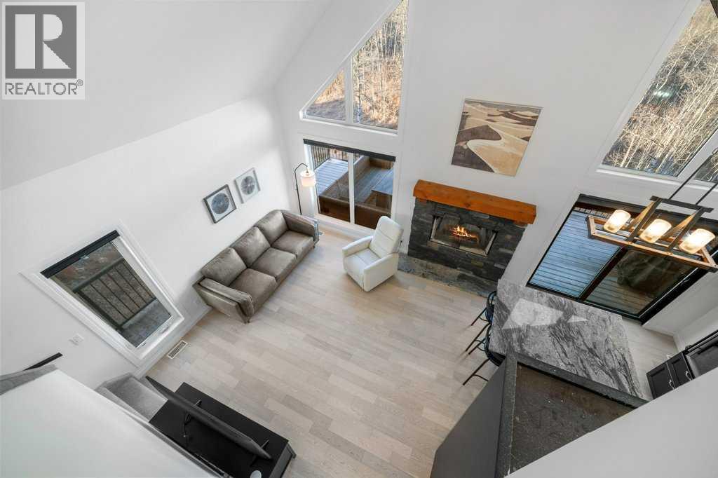 247 Cottageclub Crescent, Rural Rocky View County, Alberta  T4C 1B1 - Photo 17 - A2271474