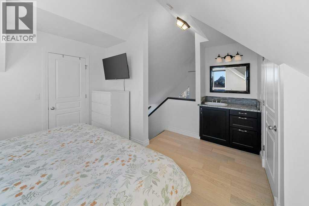 247 Cottageclub Crescent, Rural Rocky View County, Alberta  T4C 1B1 - Photo 27 - A2271474