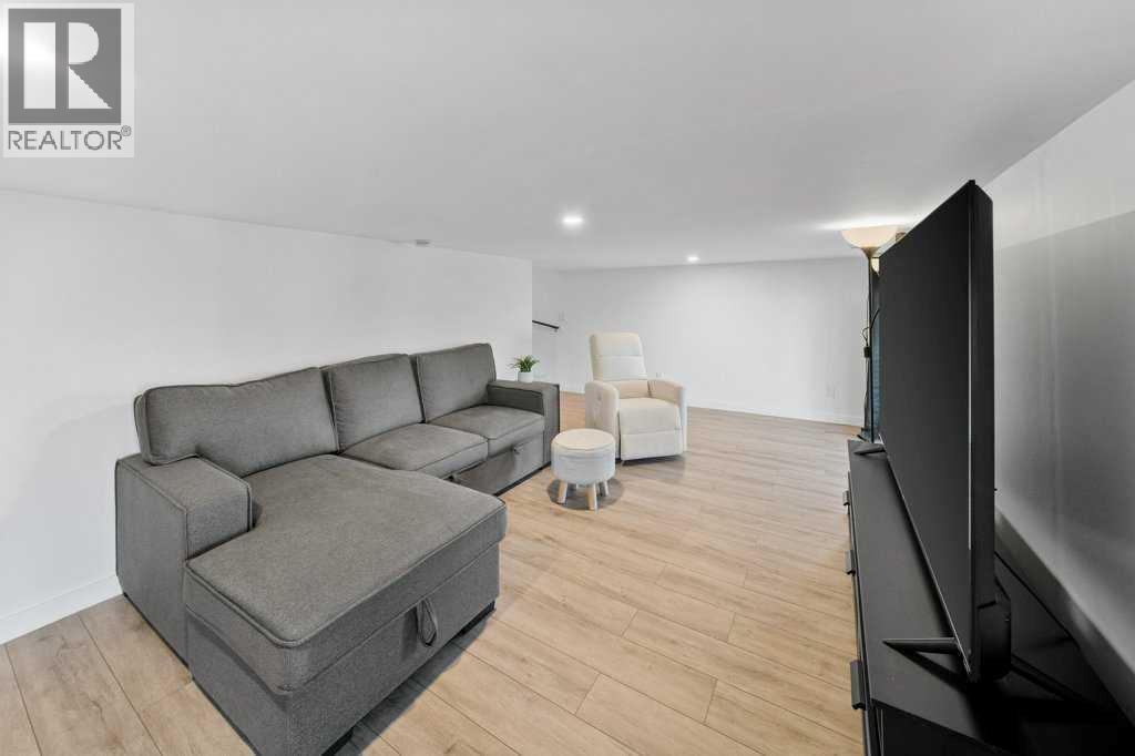 247 Cottageclub Crescent, Rural Rocky View County, Alberta  T4C 1B1 - Photo 31 - A2271474