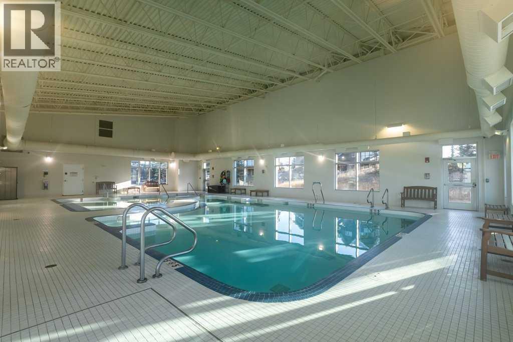 247 Cottageclub Crescent, Rural Rocky View County, Alberta  T4C 1B1 - Photo 40 - A2271474