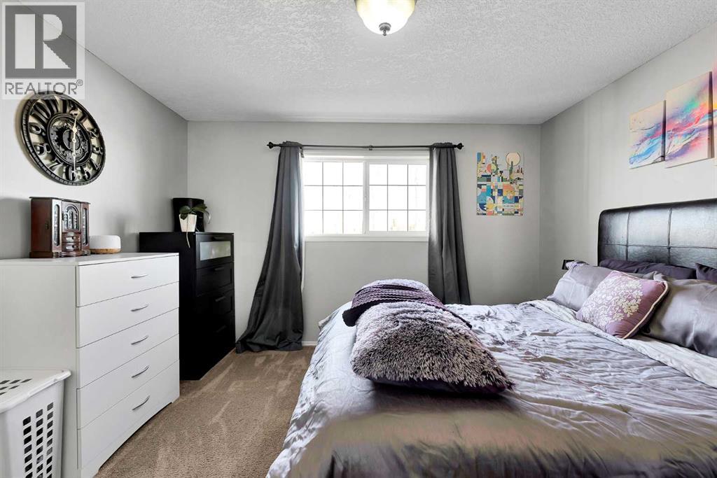 12 Bridleridge Court Sw, Calgary, Alberta  T2Y 4M5 - Photo 11 - A2286980