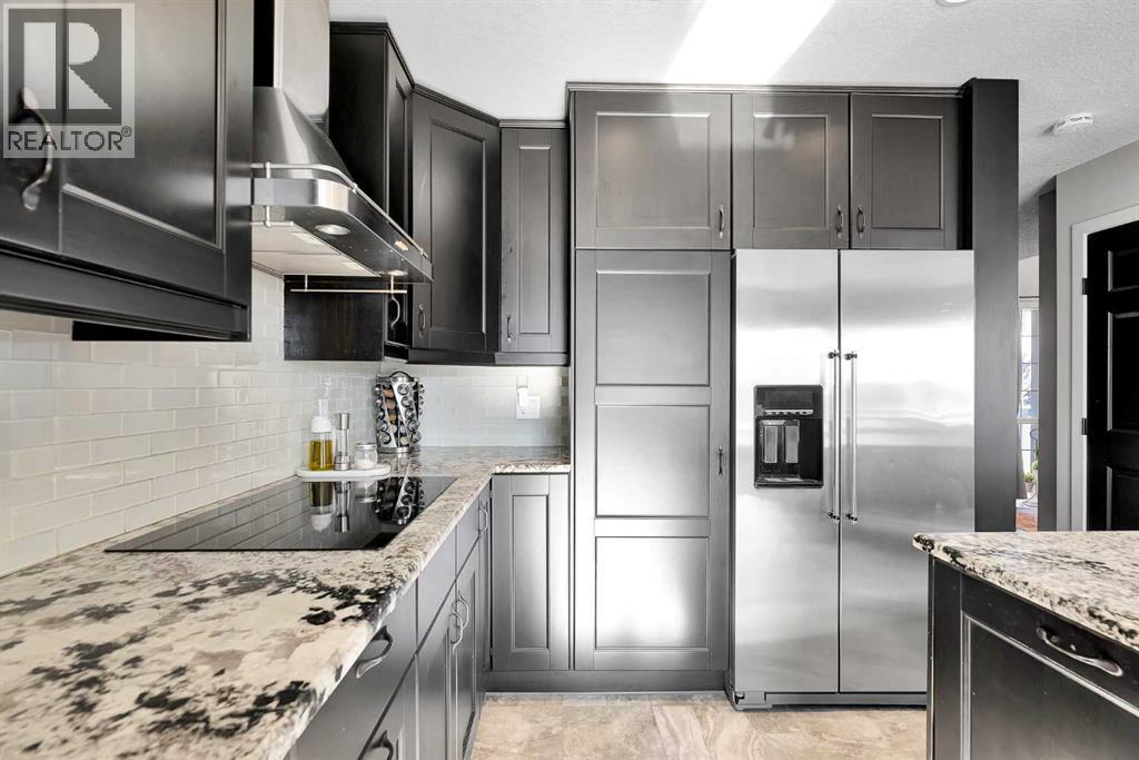 12 Bridleridge Court Sw, Calgary, Alberta  T2Y 4M5 - Photo 9 - A2286980